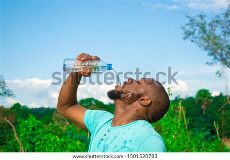 Young Black Man Drinking Water Bottle Stock Photo Edit