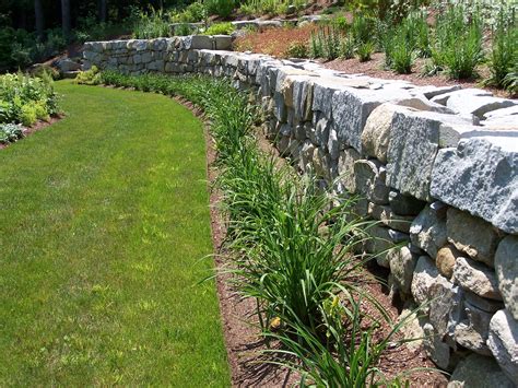 Retaining Wall Constructed Of Weathered Quarry Wallstone Hardscapes