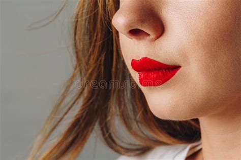 Close Up View Of Beautiful Woman Lips With Red Lipstick Stock Image