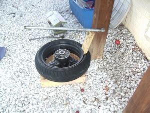 I upgrade my home bench top technique of breaking tire beads, i added a long home made 'bolt' and use an impact to run it down. Homemade Tire Bead Breaker - HomemadeTools.net