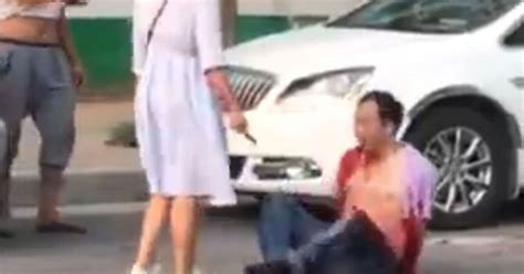 Knife Wielding Woman Stabs Cheating Husband In Street In Front Of