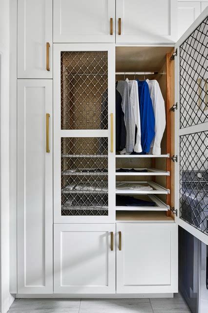 It performs like an accelerated clothes line allowing clothing and garments to last longer without the excessive wrinkle action like a traditional tumble dryer. Fossil Creek Laundry Room- Drying Cabinet - Transitional ...