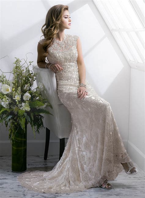 A corseted long wedding dress with a long satin train is perfect for a marriage on a hillside. 10 Breathtaking Designer Wedding Dresses 2014 - BestBride101