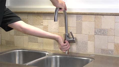To install a kitchen faucet, start by closing the water valves on your old faucet and unplugging the garbage disposal if you have one. Installing a Pfister 1-Handle Kitchen Faucet - Solo ...