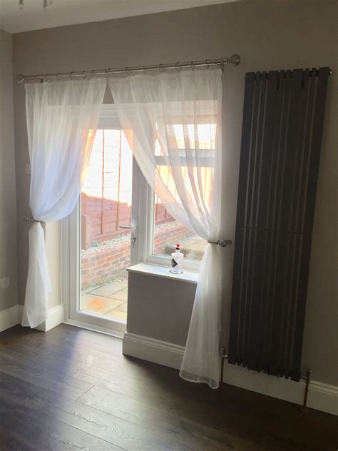 Mesh curtains and curtain pole from du elm.co.uk Vertical radiator