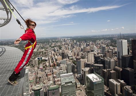 Torontos Cn Tower Unveils Risky Walk Space Needle Sticks To Space