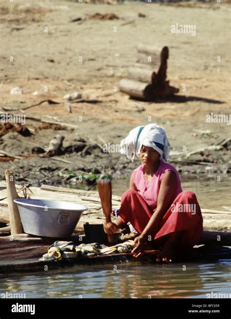 Burmese Women Washing Clothes In Irrawaddy River Mandalay Burma Stock