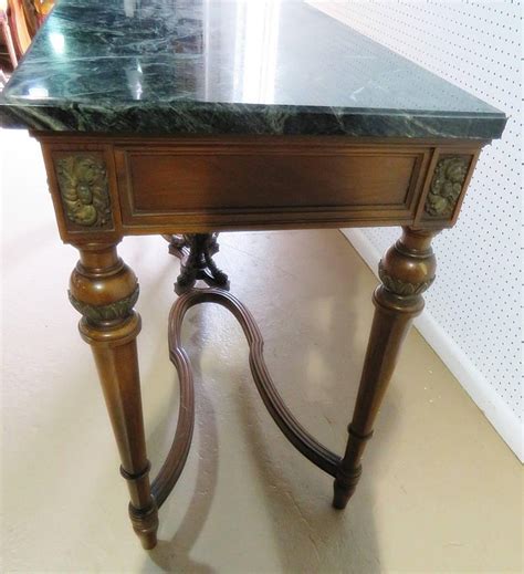 A console table or sofa table is a highly versatile and functional piece of furniture. Regency Style Marble-Top Console Table For Sale at 1stdibs