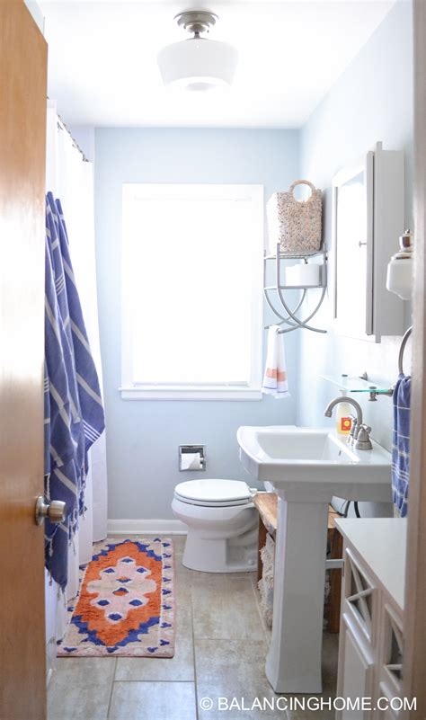 Small bathroom storage ideas, space saving plastic bins for bathtub. Small Bathroom Ideas: Clever Organizing and Design Ideas ...