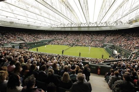 The roof, designed from waterproof tenara fabric, takes about 10 minutes to close. Retractable roof over Wimbledon's Centre Court closed.