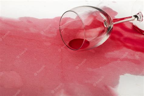Premium Photo Spilled Glass Of Red Wine