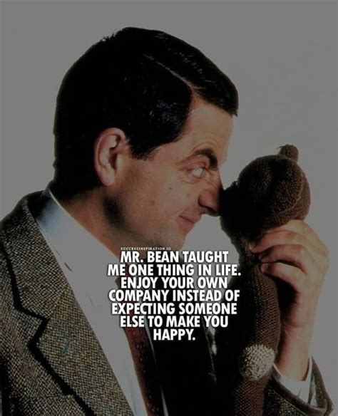 A Man In A Suit Talking On A Cell Phone With A Quote From The Movie Mr Bean