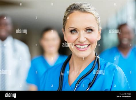 Beautiful Medical Nurse And Colleagues In Hospital Stock Photo Alamy