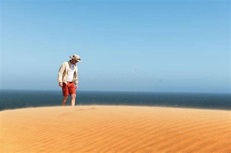 Single Man In A Cowboy Hat Takes A Selfie In The Namib Desert Stock