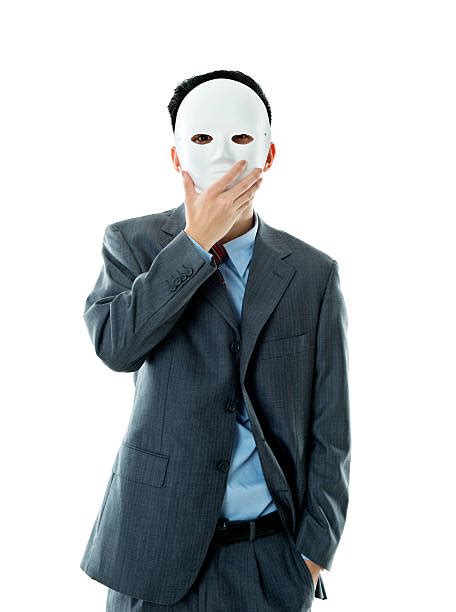 570 Hiding Behind A Mask Stock Photos Pictures And Royalty Free Images