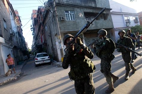 Brazil Military Continues Raids On Slums Before World Cup Cbc News