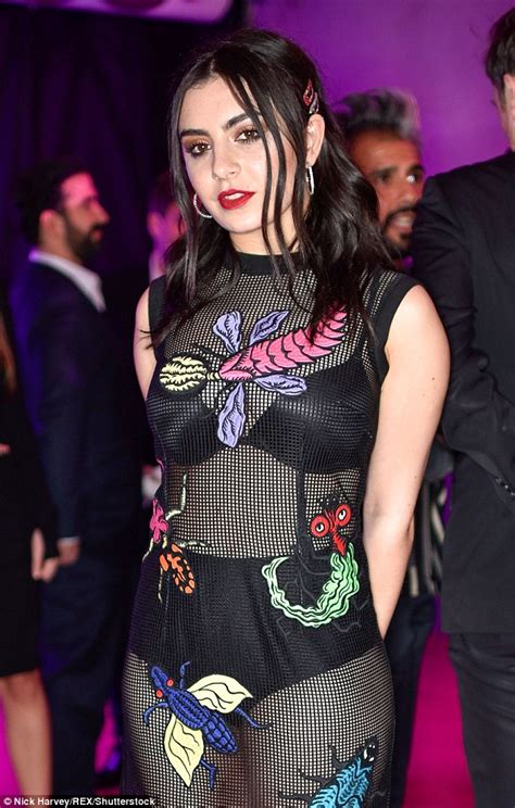 Charli Xcx Steps Out In Insect Themed Sheer Dress For Naked Heart