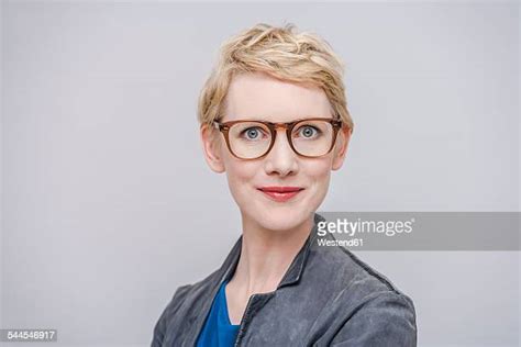 Woman Short Hair Glasses Photos And Premium High Res Pictures Getty