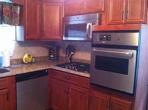 A kitchen cabinet refacing makeover is done by painting or refinishing your cabinetry through our replacement program. Kitchen Cabinet Refacing by the Professionals at The Home ...