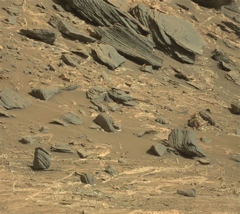 This image from nasa's mars rover curiosity shows what scientists have dubbed the otjizonjati outcrop in the distance to the northwest. Raw Images - NASA Mars