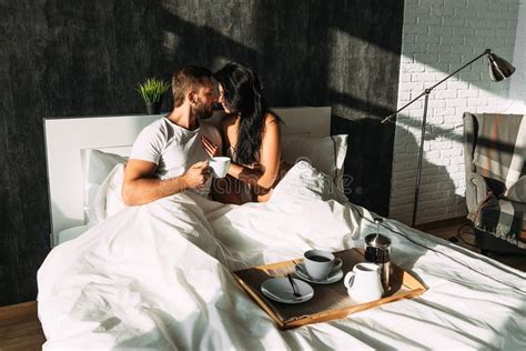 Guy And Girl In Bed Loving Couple In Bed Breakfast In Bed Tea In Bed