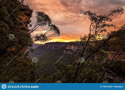Sunset Over The Cliffs And Valleys Of Blue Mountains Stock Photo