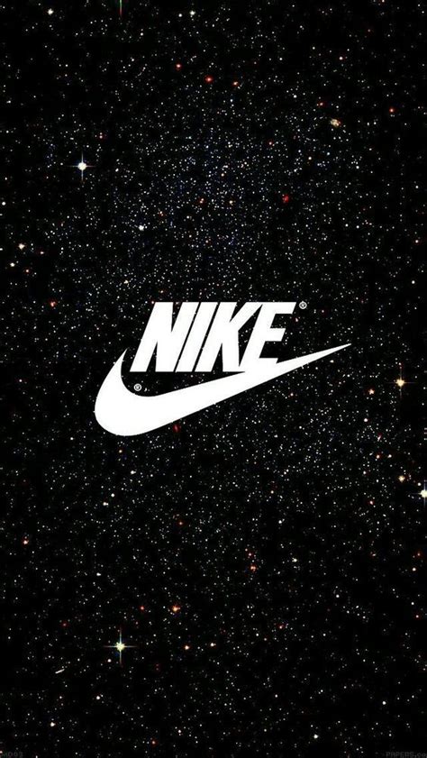 The Nike Logo Is Shown On A Black Background With White Dots And Stars Around It