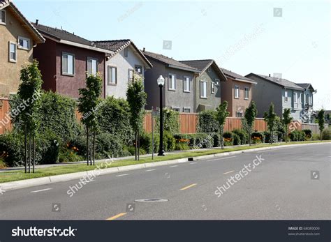 Row Of Houses In Suburban Neighborhood Stock Photo 68089009 Shutterstock