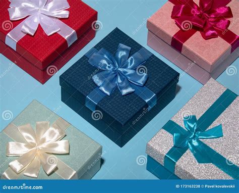 Different Colored T Box On Pastel Blue Background Various Present