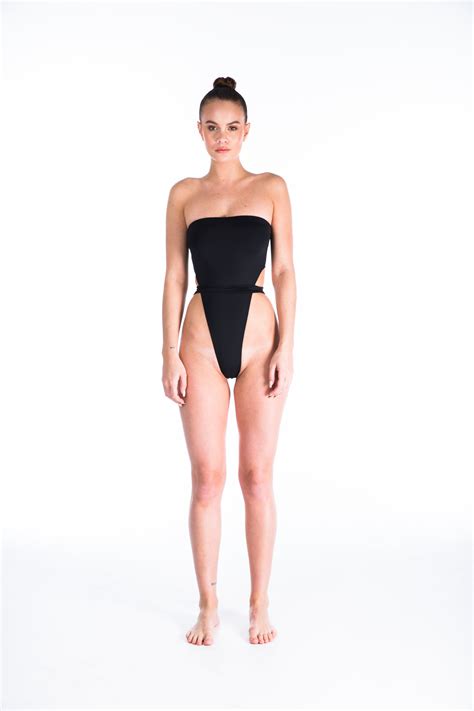 splurge karrueche s miami beach myra swim brax black one piece high cut leg belted swimsuit and
