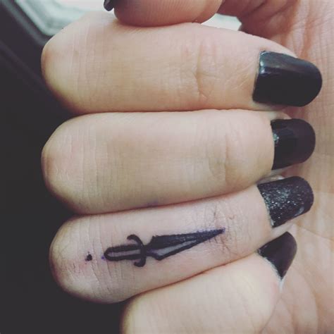 Small Simple Dagger Tattoo On My Finger Simple Finger Tattoo