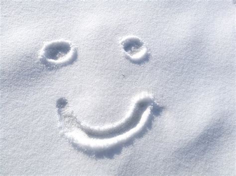 Drawing Happy Smiley Face On Snow In The Winter Time Background Symbol