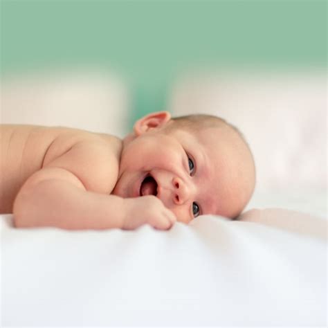 Babys Lachen - Entwicklung des Babys - Swing2Sleep