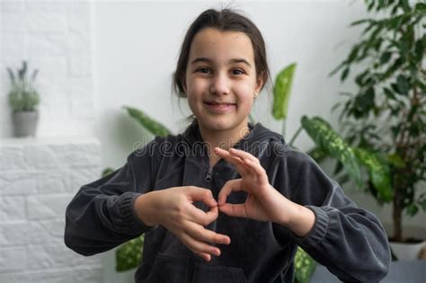 Beautiful Smiling Deaf Girl Using Sign Language Stock Photo Image Of