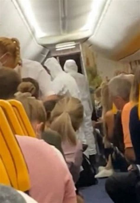 Ryanair Passenger Dragged Off Plane By Officials In Hazmat Suits