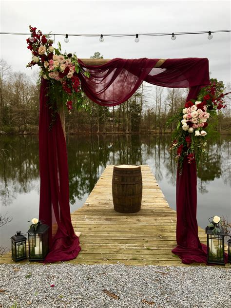 A lush circle wedding arch covered with blush and deep red roses and greenery. Pin by kristle patete on GARDEN & FLORALS | Future wedding ...