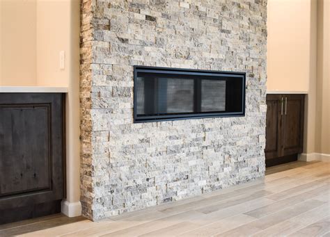 This Contemporary Fireplace With Exposed Brick Adds Warmth And Design