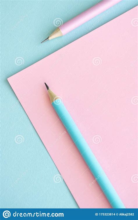 Pastel Colored Pencils On Empty Sheet Blue And Pink Tones Stock Photo