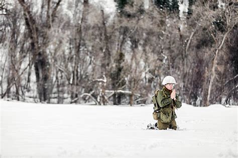 Soldier Kneeling In Prayer Stock Photos Pictures And Royalty Free Images
