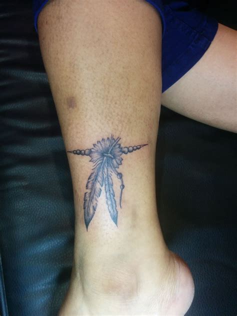 The Symbolism And Meanings Of Feather Tattoos Every Feather Tattoo Isn