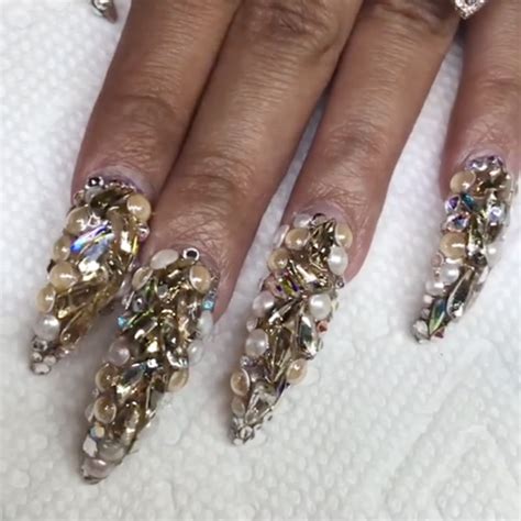 Here's how cardi b gets her one of a kind nails, with the help of longtime pro artist, jenny bui, of nails on 7th ave. Cardi B Gold Beads, Nail Art, Pearls, Stones Nails | Steal ...