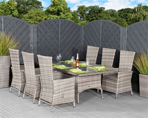 Large Rectangular Rattan Garden Dining Table And 6 Reclining Chairs In