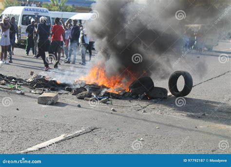 Community Staging A Protest Blocking A Road During A Taxi Strike In
