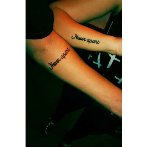 Do you have a story to tell about your. Forearm matching tattoos saying "Never apart" on