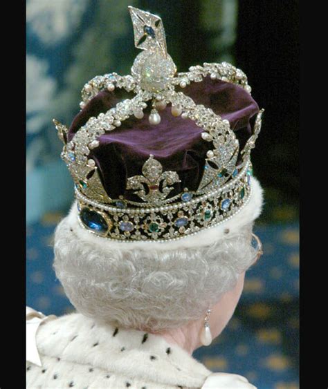 Queen Elizabeth Ii Is Seen Wearing Her Crown At The House Of Lords