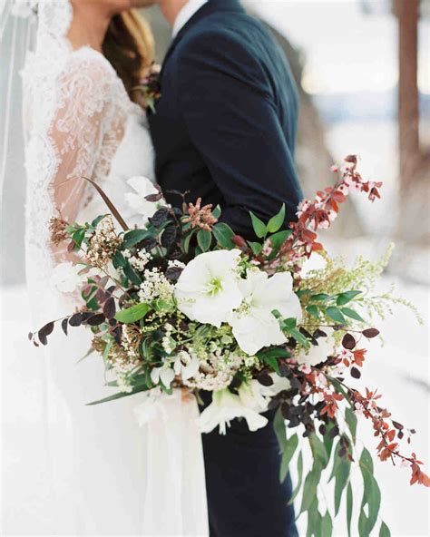 Orange and blue winter wedding bouquet. 52 Gorgeous Winter Wedding Bouquets | Martha Stewart Weddings
