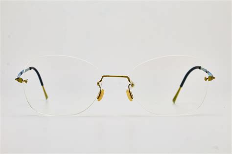 lindberg spirit titanium rimless glasses p60 color tone oval etsy