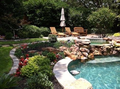 Pull out any weeds in potted plants, gardens, or the grass; Pool Landscaping Tips | 5 Ideas to Increase Appeal