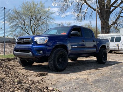 2015 Toyota Tacoma With 16x8 12 Pro Comp 69 And 31105r16 Goodyear