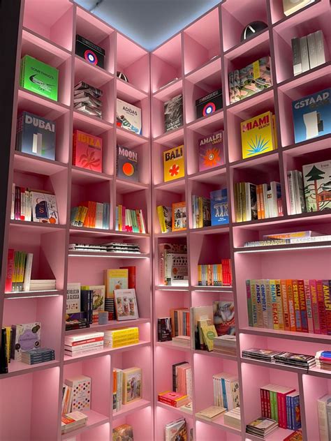 Lit Pink Bookcase With Coffee Books And Design Books Coffee Shop